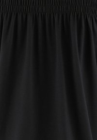 Tamaris T-shirt à manches longues - black beauty