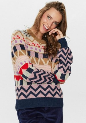 Strickpullover mit mehrfarbigen geometrischen Mustern, gerippten marineblauen Bündchen und rundem Halsausschnitt. Weicher Stoff mit lockerem Schnitt.