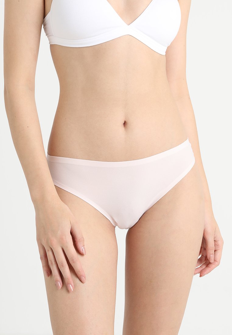 Light pink bikini bottom made of smooth fabric, featuring a minimalist design and low-rise cut with a soft waistband. No patterns or hardware.