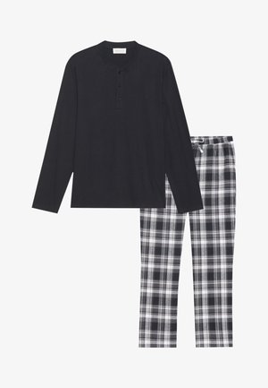 Melnas garas piedurknes henley tunika ar trim pogām, kombinēta ar melnbaltiem raibiem biksēm. Kokvilnas materiāls, brīvs piegriezums, mīksta tekstūra.