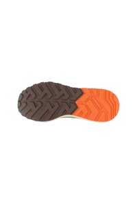 Footwear sole featuring a zigzag tread pattern, with dark brown rubber on the heel and arch, and an orange rubber section near the forefoot.