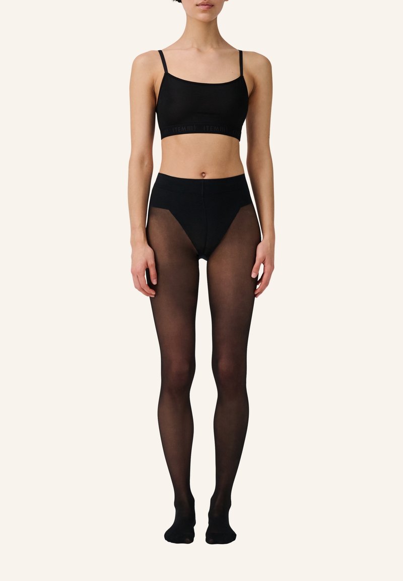 Bralette nero senza cuciture e collant trasparenti a vita alta. Tessuto morbido con un design aderente. Vita elastica e spalline minime.