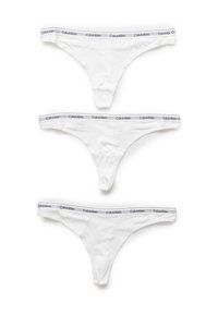 Drie witte katoenen strings met grijze Calvin Klein logo tailleband, die een gladde textuur en minimalistisch ontwerp tonen.