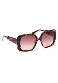 Occhiali da sole tartarugati con una forma quadrata audace, lenti rosa sfumate e bracci sottili in materiale acetato. Marchio Max&Co. visibile.