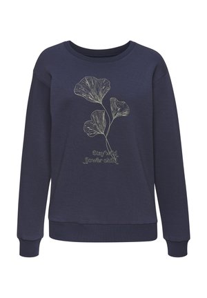 Navy blauwe sweatshirt gemaakt van zachte stof, met een botanische print van bladeren en de tekst "Stay wild, flower child" in lichte kleur.