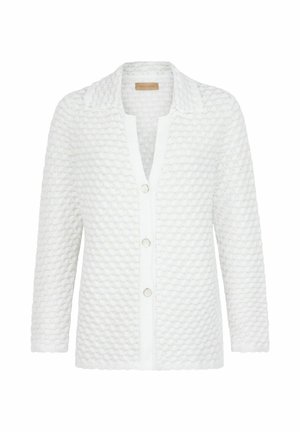 Cardigan en maille blanc texturé avec col et trois boutons devant, présentant un motif nid d’abeille et des manches longues.