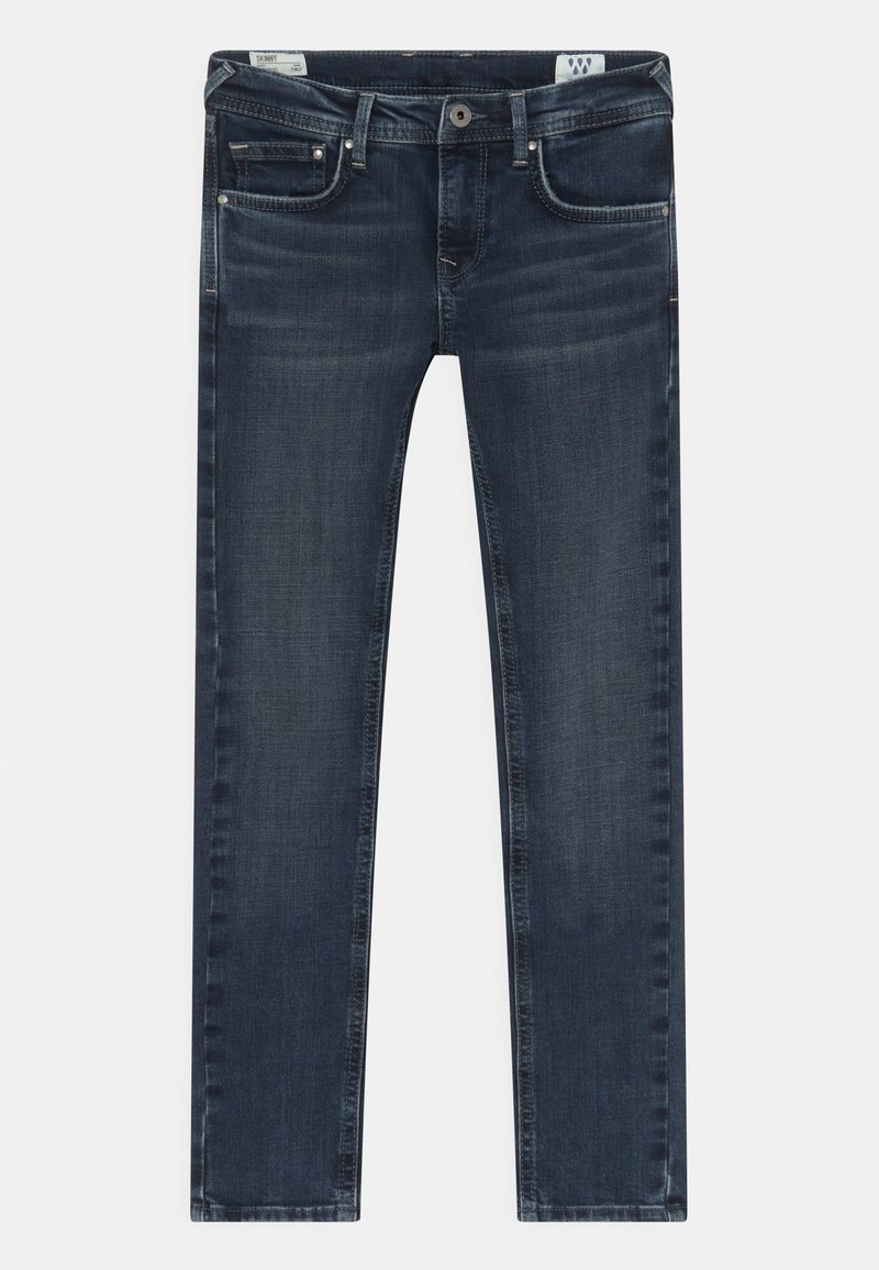 Jean skinny bleu foncé avec poches avant, fermeture par boutons et décoloration subtile aux cuisses et aux genoux, posé à plat sur un fond blanc.