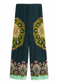 Pantalon à jambes larges en tissu vert foncé avec de grands imprimés floraux jaunes et roses. Matière texturée avec un détail de ourlet à motif.