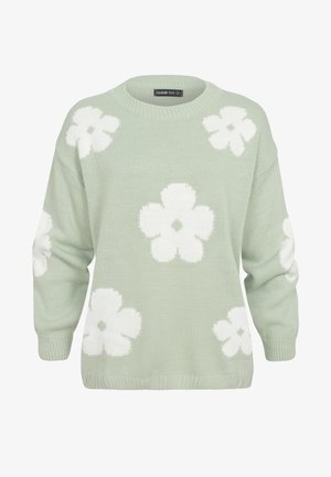 Šviesiai žalias mezginys megztinis su dideliais baltais gėlių raštais, apvalia iškirpte ir ilgomis rankovėmis su austojo audimo rankogaliais ir apačia.