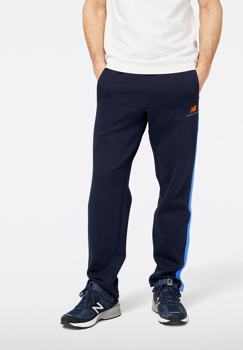 New Balance Verryttelyhousut - eclipse/tummansininen - Zalando.fi