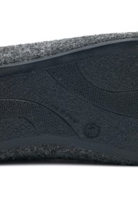 Black rubber outsole with textured grip pattern and a grey felt upper edge, showcasing a smooth transition between materials.