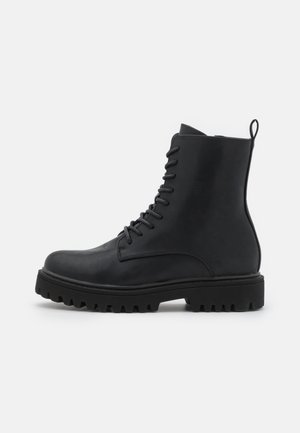 Bottines à lacets - black