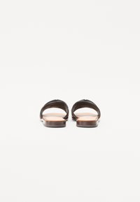 Coccinelle MONOG SLICE COW - Mules - cuir