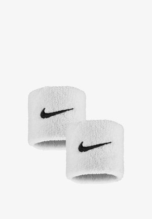 Polsini in spugna bianca con loghi Nike swoosh neri, mostrati affiancati su uno sfondo bianco.