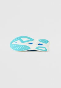 Running shoe sole with a blue and white color scheme. Features textured rubber for grip and a unique design with cut-out sections.
