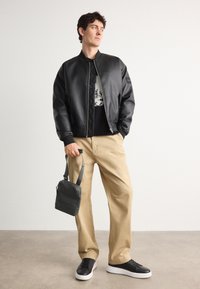 Calvin Klein TECH SENSUAL REPORTER UNISEX - Borsa a tracolla - dark olive