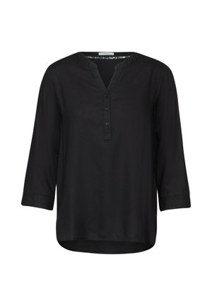 Blouse noire à manches longues avec un décolleté en V, trois boutons au plastron et un ourlet arrondi. Fabriquée en tissu lisse avec un éclat subtil.