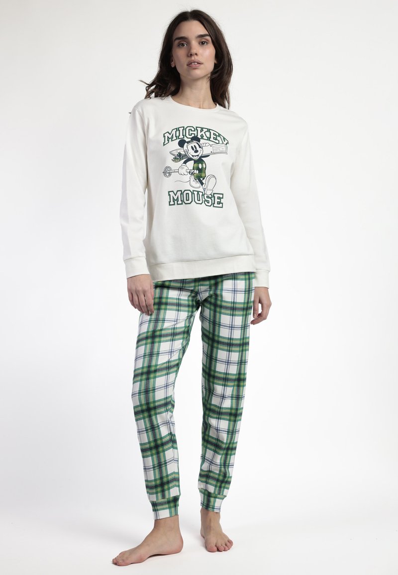 Maglietta bianca a maniche lunghe in cotone con stampa di Topolino verde, abbinata a pantaloni del pigiama a righe verdi e bianche con elastico in vita.