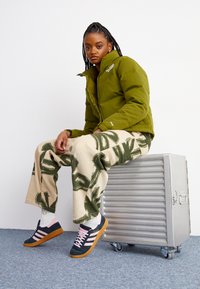 The North Face RIPSTOP NUPTSE JACKET - Piumino - forest olive
