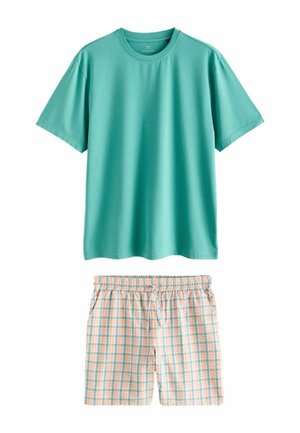 Schlichtes Türkisfarbenes T-Shirt mit kurzen Ärmeln, kombiniert mit Shorts mit elastischem Bund in einem blau-schwanzen, pfirsichfarbenen und weißen Karomuster.