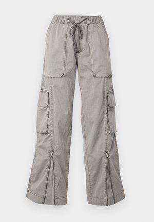 Pantaloni cargo grigio chiaro con elastico in vita, lacci regolabili, multi tasche laterali e orli con zip. Realizzati in tessuto morbido e leggero.