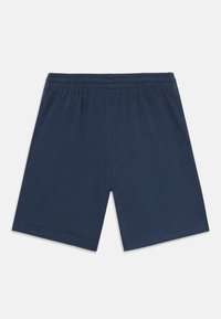 Marineblå jersey-shorts med elastisk liv, som viser en glatt tekstur og en avslappet passform. Ingen lommer eller designmønstre.