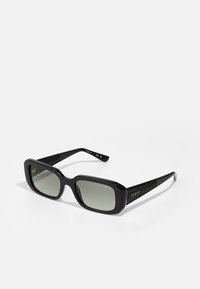 Black rectangular sunglasses with gradient lenses and textured black arms, featuring a logo print and distinctive woven pattern on the sides.