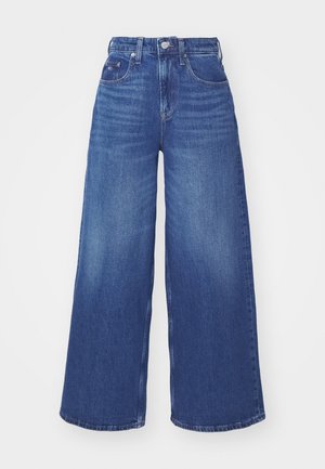 Hogwaisted blauwe denim jeans met brede pijpen, riemlussen, knoop aan de voorkant, ritssluiting en voor- en muntzakken.