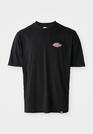 Black cotton t-shirt with a crew neckline, short sleeves, and a small red and white Dickies logo on the chest. Classic fit.