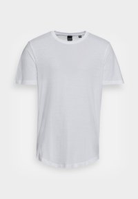 White cotton t-shirt with short sleeves, round neckline, and a curved hem. Soft texture with no patterns or accents visible.