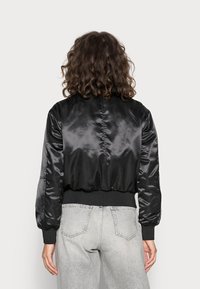 Calvin Klein Jeans REVERSIBLE - Blusão aviador - black