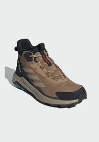 adidas Sportswear TERREX ANYLANDER MID - Turistické topánky - cardboard   blanch cargo   shadow olive