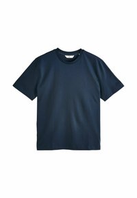 Camiseta de algodón azul marino con mangas cortas y cuello redondo. Presenta una textura suave y un diseño de corte relajado.