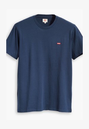 T-shirt in cotone blu navy con maniche corte. Presenta un piccolo logo rosso di Levi’s sul lato sinistro del petto e un classico scollo a girocollo.