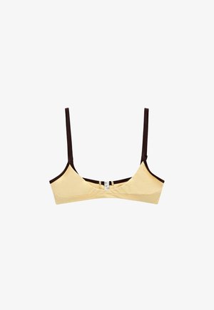 Bralette beige con sottili spalline regolabili marrone scuro e chiusura frontale con gancio, mostrata su sfondo bianco.
