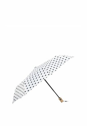 Biały parasol w czarne kropki, czarna trzonka i beżowa rączka z przyciskiem do otwierania i zamykania.