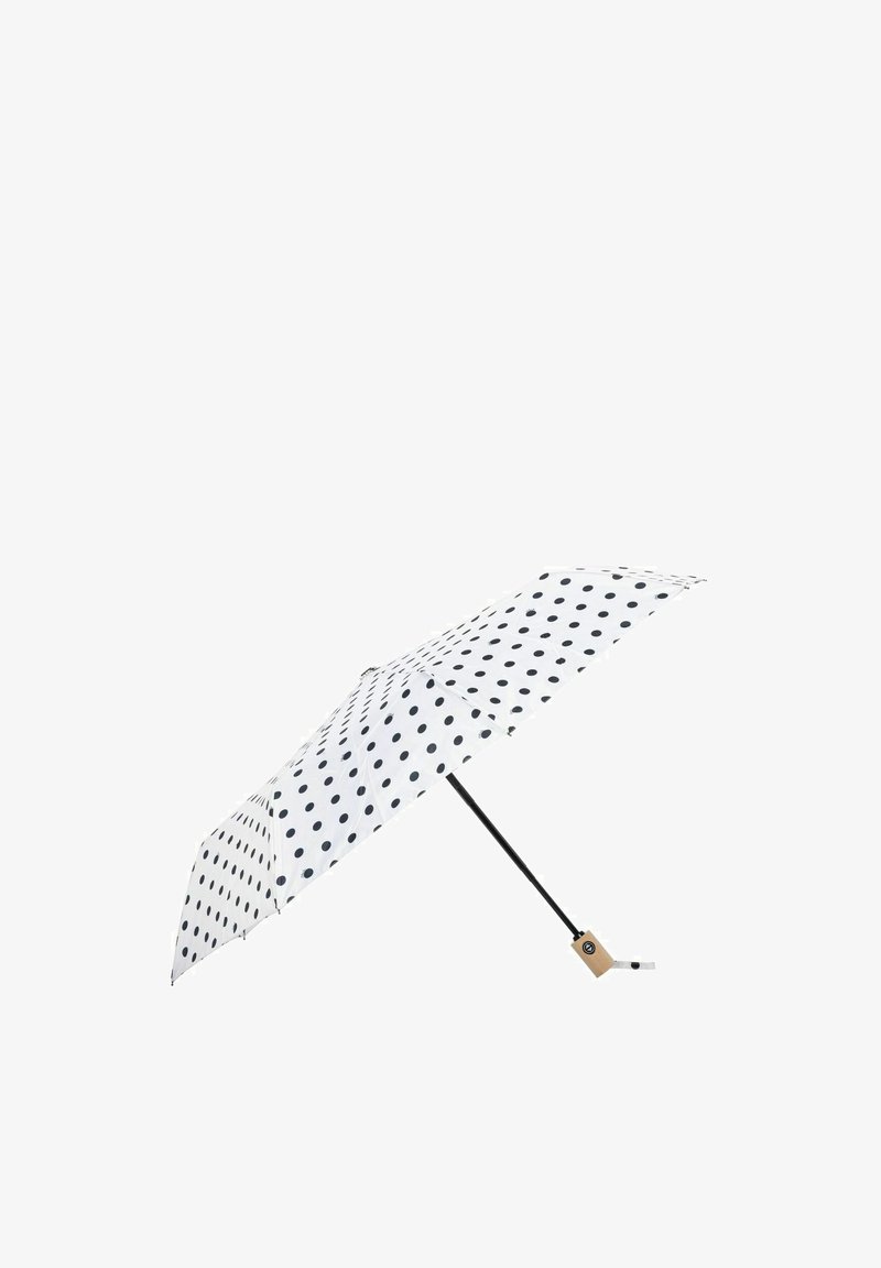 Biały parasol w czarne kropki, czarna trzonka i beżowa rączka z przyciskiem do otwierania i zamykania.