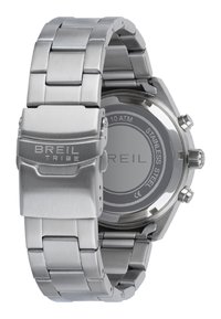 Montre en acier inoxydable argenté avec un bracelet à maillons, boîtier rond, lunette lisse et détail du logo sur le fermoir. Résistante à l'eau jusqu'à 10 ATM.