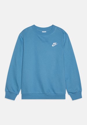 Sininen pitkähiha Nike-paita pyöreällä kaula-aukolla, resorilla varustetut hihansuut ja helma, valkoinen Nike-logo vasemmalla rinnassa.