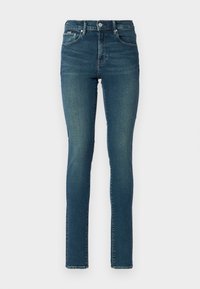 Vaqueros pitillo - worn in meadows