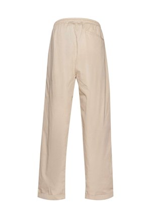 Pantalones beige de corte holgado con cinturilla elástica y un único bolsillo trasero. Textura suave con corte recto y dobladillo enrollado.