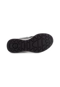 Zwarte rubberen buitenzool met een gestructureerd grip-patroon, voorzien van een cirkelvormig logo en merkdetail aan de zijkant.