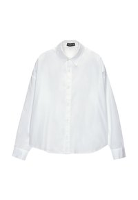 Chemise blanche à manches longues avec col et poignets boutonnés, présentée à plat sur un fond blanc uni.