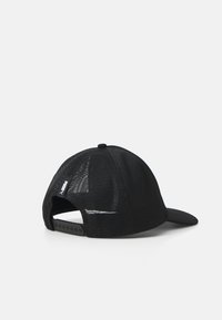 Black cap with mesh back, curved brim, adjustable snap closure, and a small brand label on the side. Textured material with a solid design.