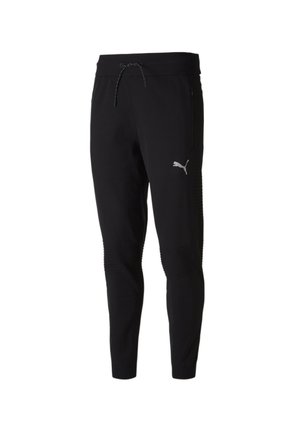 Sorte slim-fit joggerbukser fra Puma med elastisk talje, snøre, lynlåslomme på siden og Puma-logo på låret.