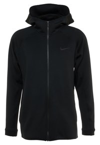 Sudadera con cremallera negra de Nike con capucha, fabricada en un tejido texturizado y con un logo sutil en el lado izquierdo del pecho. Cremalleras suaves y mangas acanaladas.