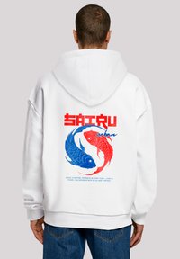 White hooded sweatshirt featuring a blue and red koi fish graphic on the back, with stylized text and a decorative circular design.