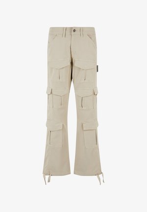 Beige tehernadrág tartós pamutból készült. Több nagy zsebbel és húzózsinórral rendelkező szárakkal rendelkezik. Egyenes láb kialakítású, elöl gombos záródással.