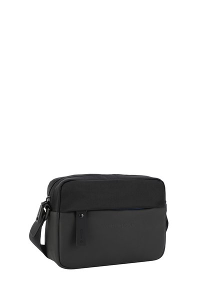 Sac messager noir en tissu texturé et en matériau synthétique lisse. Doté d'une fermeture éclair et d'une bandoulière pour un port en travers.
