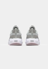 Pair of gray and white Puma sneakers shown from the back, featuring mesh fabric, pull tabs, and soft foam soles with light pink tread.